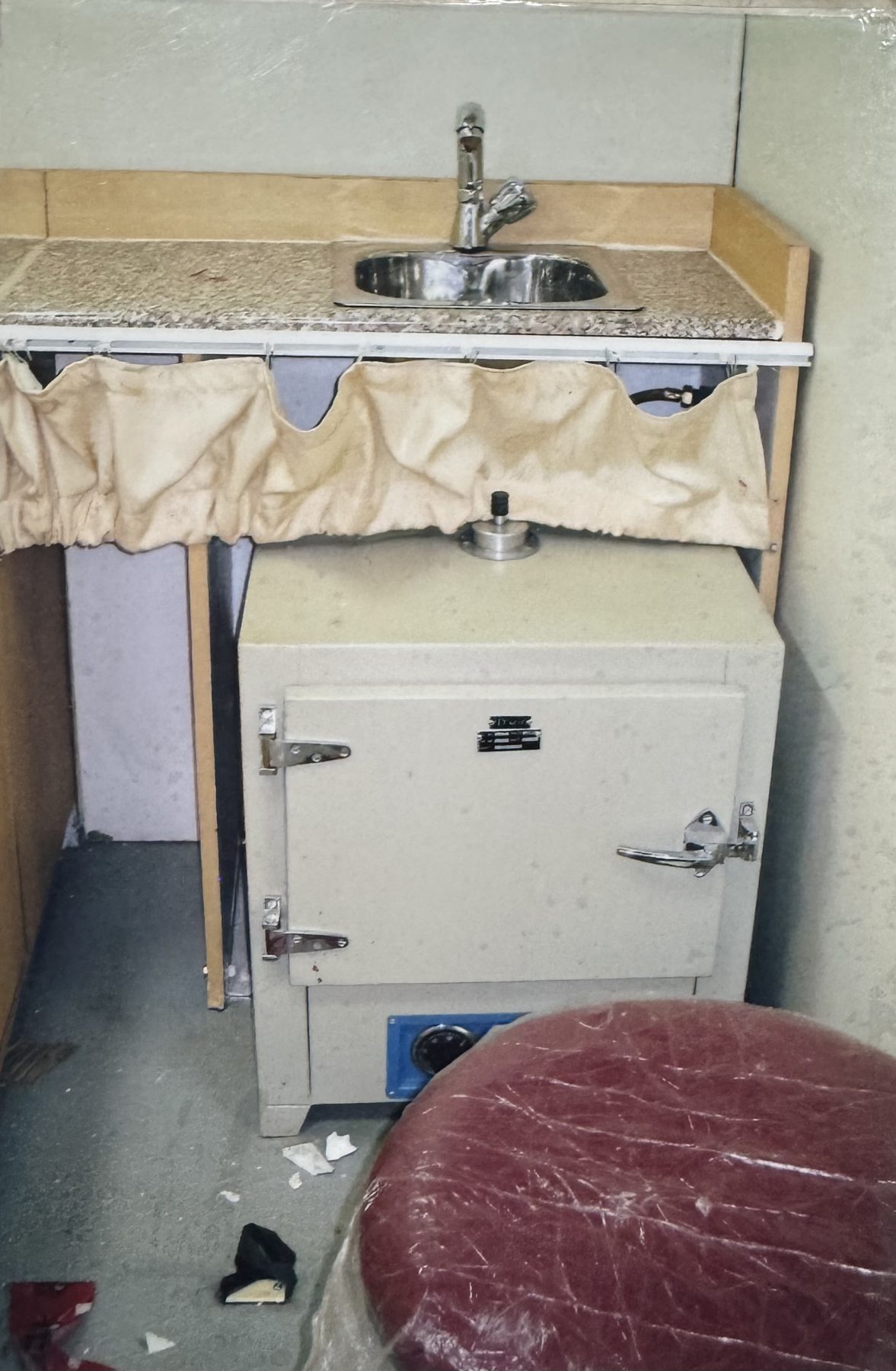 Built-in sink and cabinetry inside an Ultratech-built mobile hospital